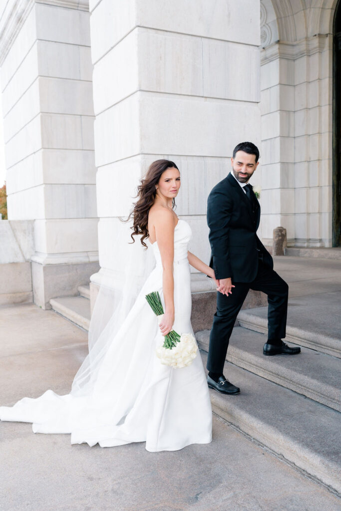 Providence Wedding Photographer | Newport Photography By Caprio Captured Light And Airy | Bride and groom walking up the stairs