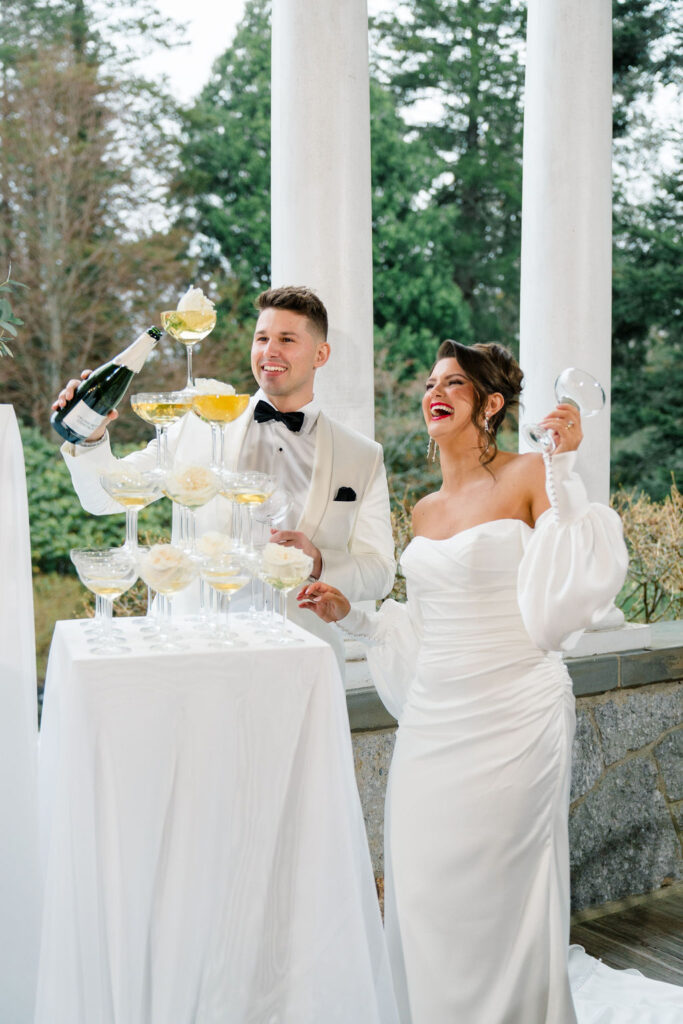 Blithewold Wedding | Rhode Island Wedding Photographer | Bride and groom with a champagne tower