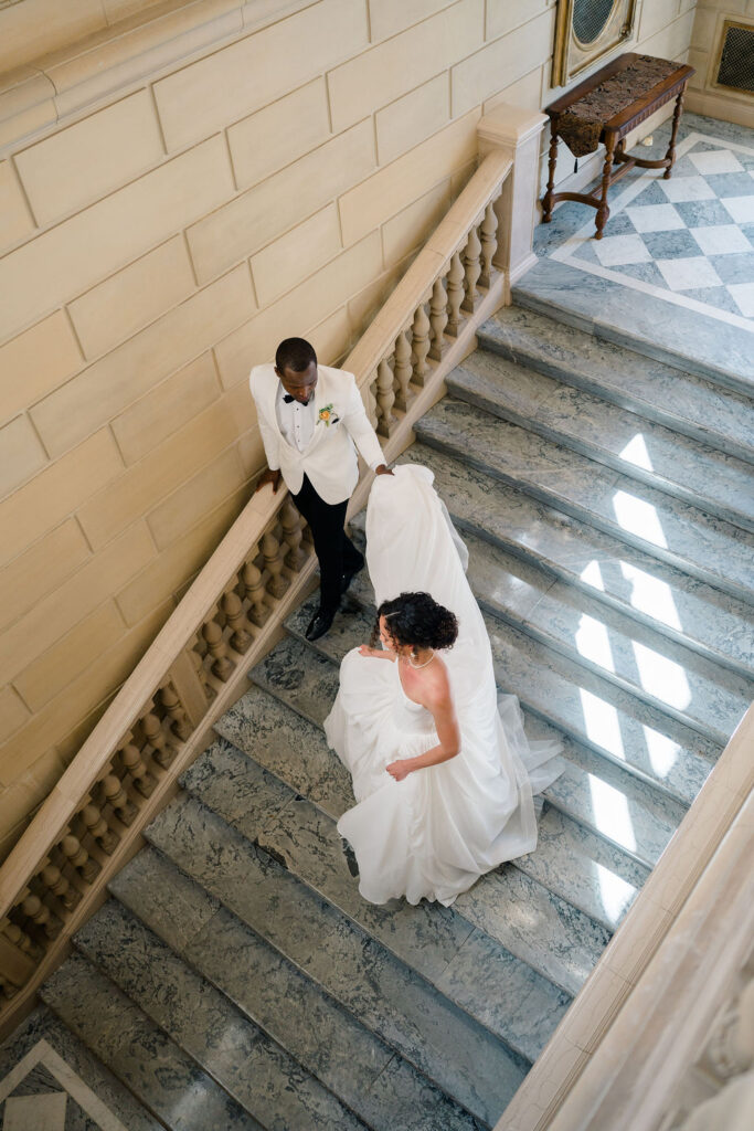 Aldrich Mansion Wedding | Bride and groom walking down the Aldrich Mansion stairs
