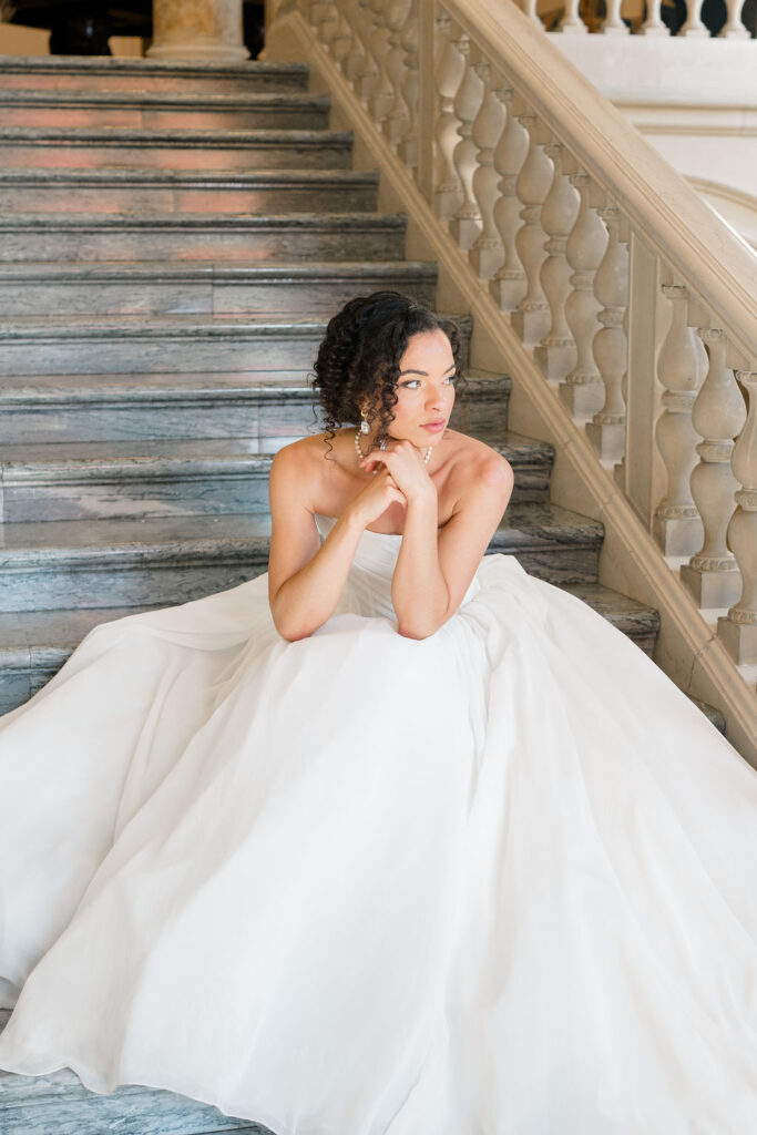 Aldrich Mansion Wedding | Bride sitting on the staircase at Aldrich Mansion